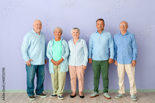 Senior people near color wa...
