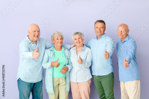 Senior people showing thumb...
