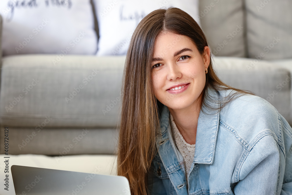 Beautiful young woman with laptop at home Beautiful young woman with laptop at home