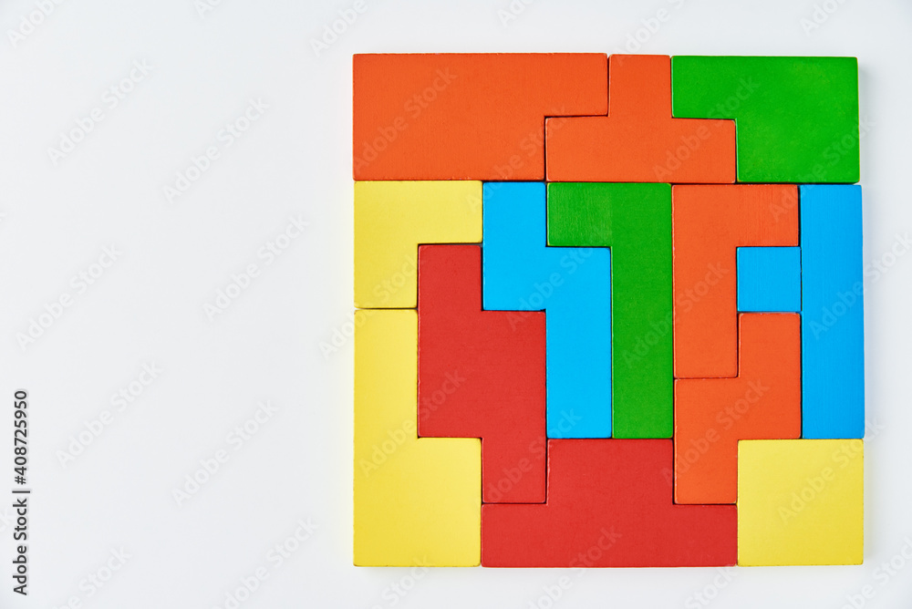 Obraz premium Different wooden blocks on white background. Concept of logical thinking and education