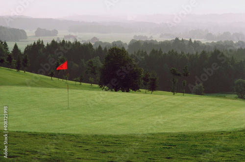 Golf flag in a golf course, Bavaria, Germany photo