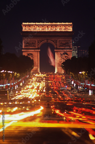 Triumphal arch in a city at night, Arc De Triomphe, Paris, Ile-de-France, France