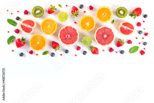 Fototapeta Naklejka Na Ścianę i Meble -  Fresh fruit design template, a flatlay overhead shot on a white background, vibrant food pattern with a place for text