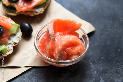 Salmon in a glass bowl. Cooking salmon toast. Close up. Copyspace