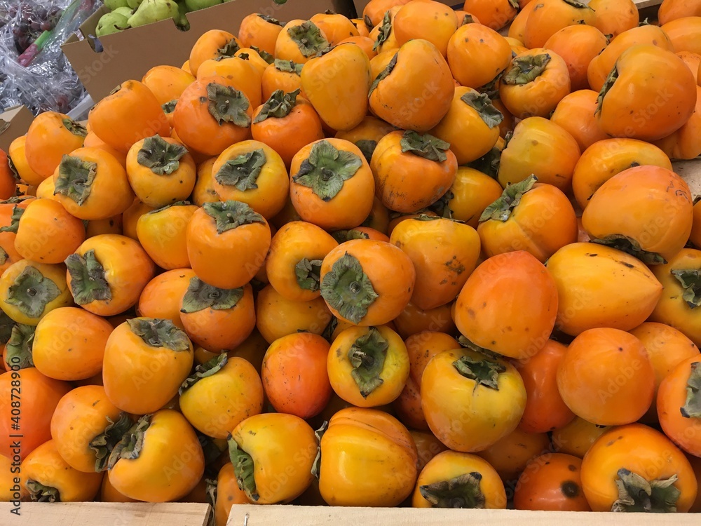 Orange Persimmon in market place