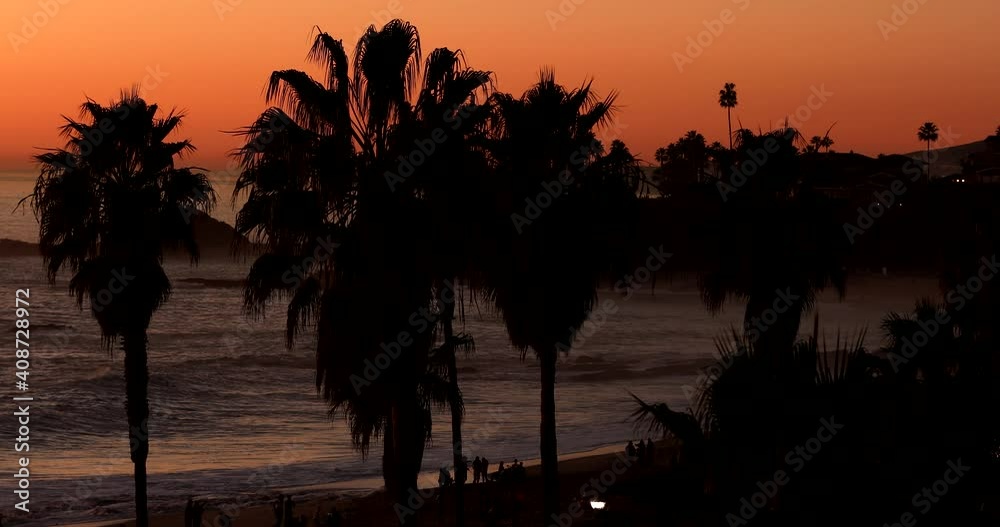 Sunset palm beach view of Laguna Beach, California, USA. Sunset palm beach view of Laguna Beach, California, USA.