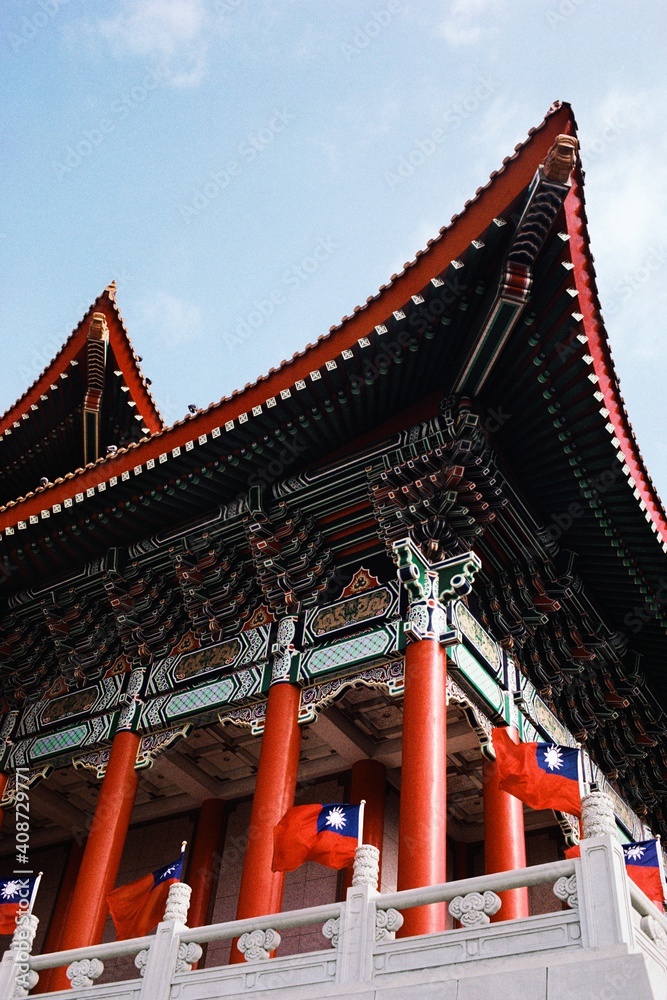 Low angle view of flags flying on the balcony of the National Theater, Taipei, Taiwan Low angle view of flags flying on the balcony of the National Theater, Taipei, Taiwan