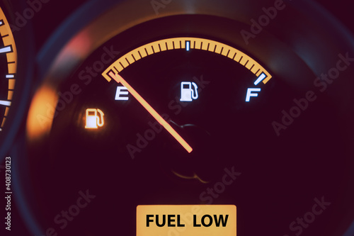 Close up low fuel guage shown in a car