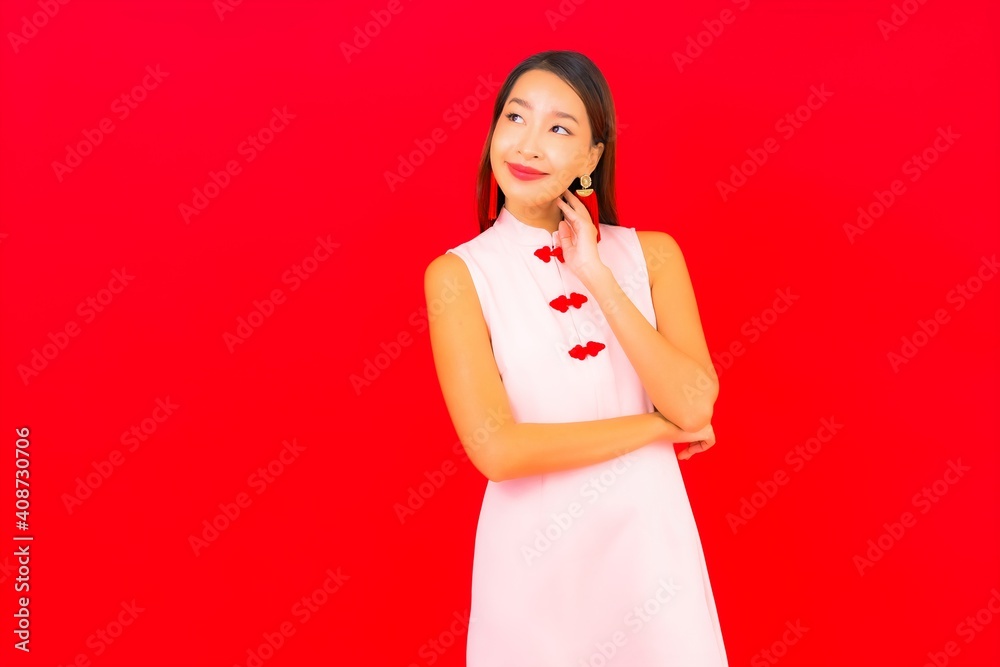 Portrait beautiful young asian woman wear chinese new year clothing Portrait beautiful young asian woman wear chinese new year clothing
