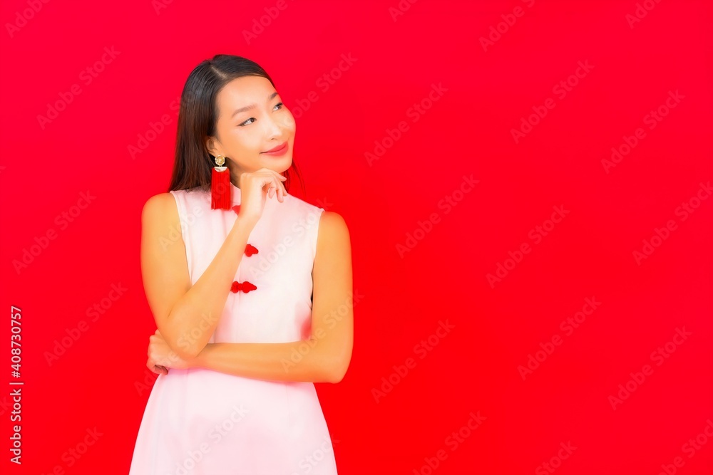 Portrait beautiful young asian woman wear chinese new year clothing Portrait beautiful young asian woman wear chinese new year clothing