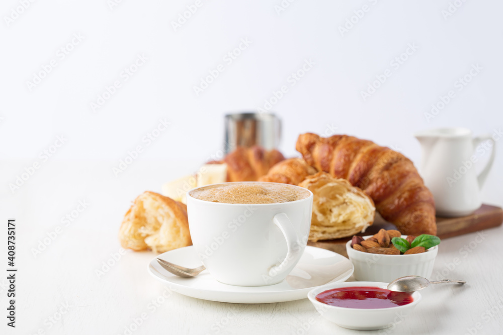 Fresh delicious breakfast with Coffee, crispy croissants, jam on white wooden background. Fresh delicious breakfast with Coffee, crispy croissants, jam on white wooden background.