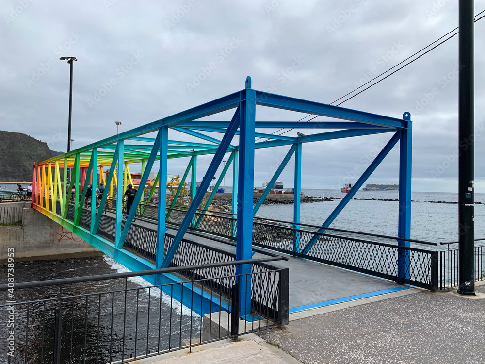 LGBTQ symbol. Bridge in city San Andres with Rainbow Colours. Tenerife Spanish island. LGBTQ symbol. Bridge in city San Andres with Rainbow Colours. Tenerife Spanish island.
