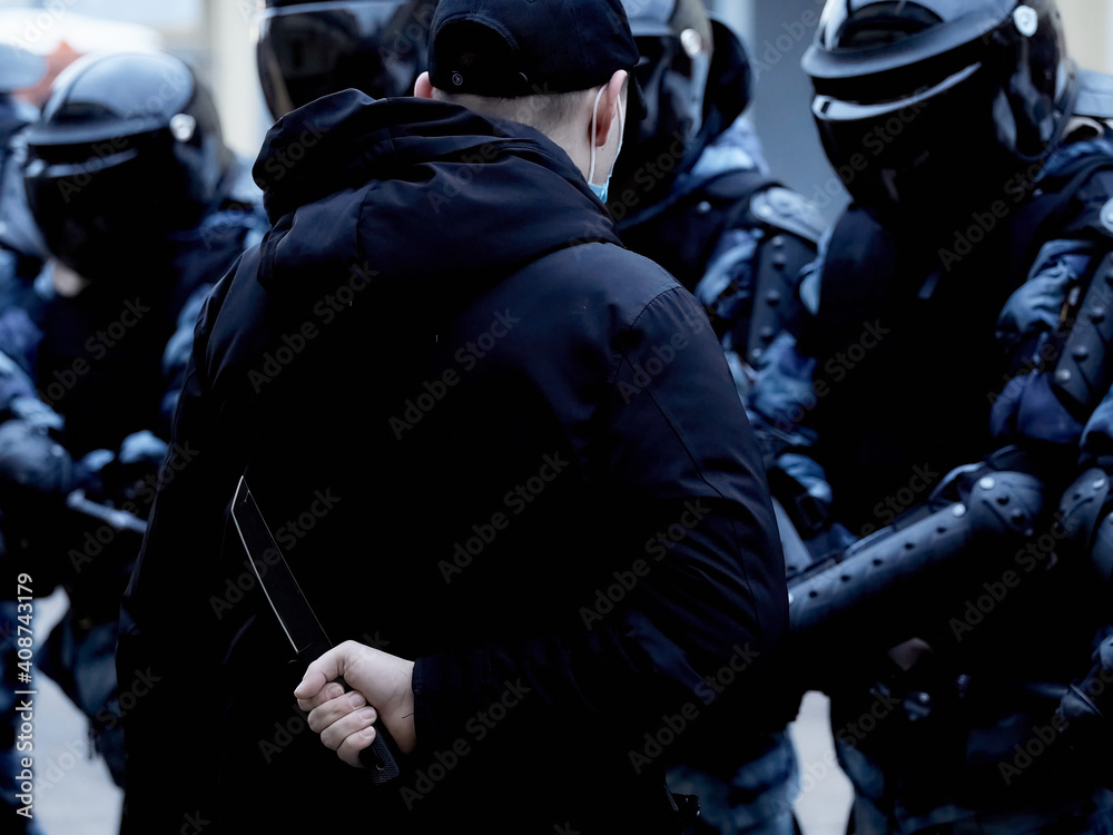 A protester attacks a soldier of the National Guard with a knife A protester attacks a soldier of the National Guard with a knife