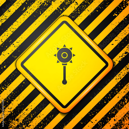 Black Medieval chained mace ball icon isolated on yellow background. Medieval weapon. Warning sign. Vector.