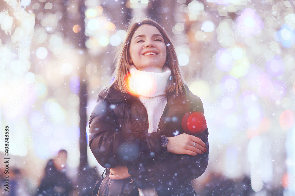 snowfall woman city christmas outside, city portrait in snowfall, young model posing in festive look snowfall woman city christmas outside, city portrait in snowfall, young model posing in festive look