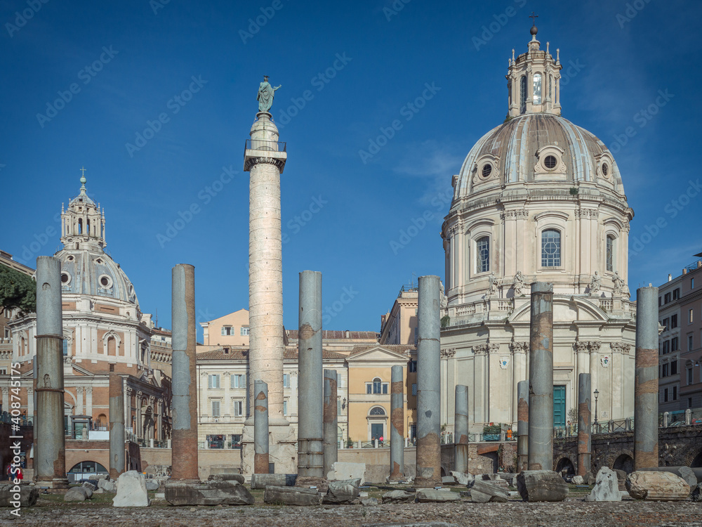 A view of the old roman Trajan's Forum with  Santissimo Nome di Maria al Foro di Traiano Church, Basilica Ulpia, Rome, Italy
