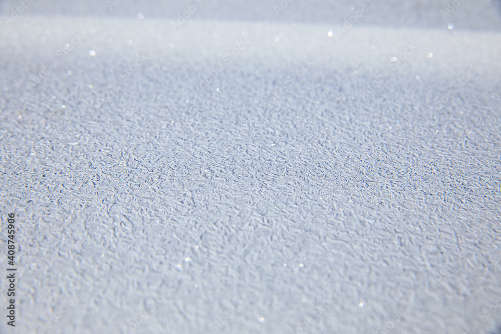 Icy texture on car hood in winter Icy texture on car hood in winter