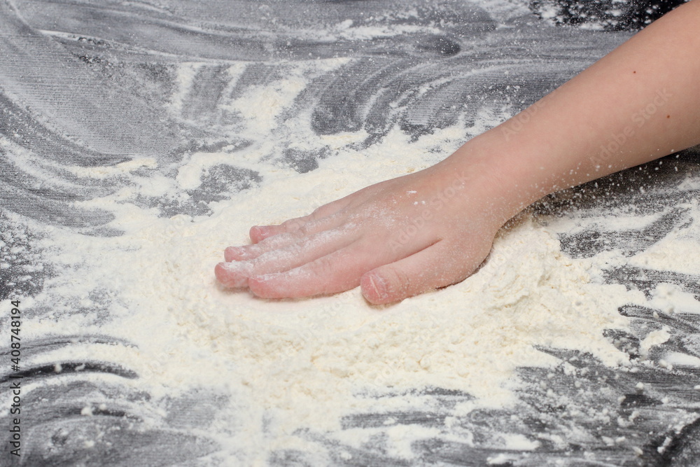 a child prepares cookie dough a child prepares cookie dough