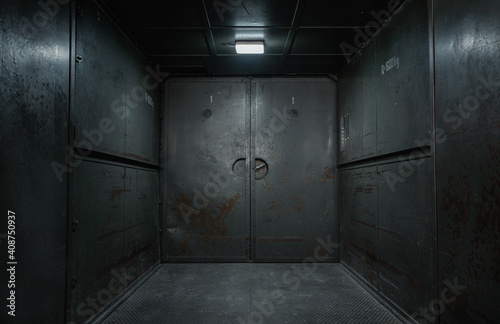 Old, empty, grunge industrial elevator interior with copy space photo