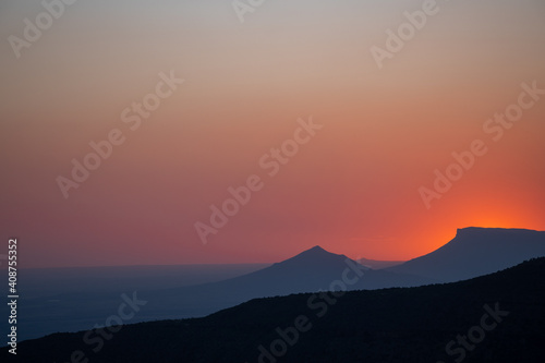 Beautiful and peaceful sunset from the heights of Camdeboo National Park in the arid Karoo region of South Africa.