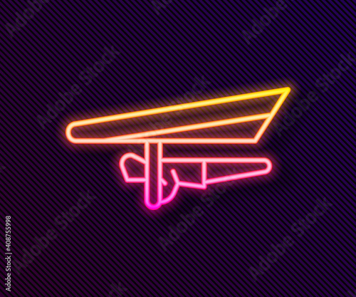 Glowing neon line Hang glider icon isolated on black background. Extreme sport. Vector Illustration.