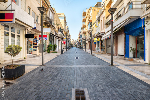 One of the main street of the Heraklion center, 25th of August. Empty street, no people. Sunny morning. Selective focus. © Maksym