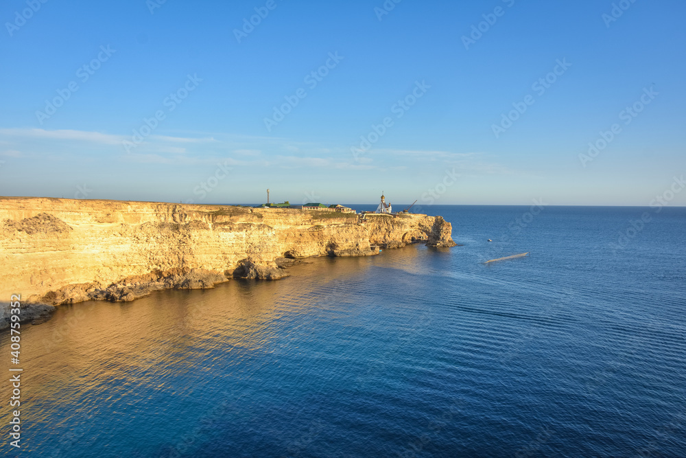 Tarhankut Cape with turquoise water on the western coast of Crimea peninsula. Summer seascape, famous travel destination. Picturesque seascape, Crimea coast beach The Black sea Yalta mountains