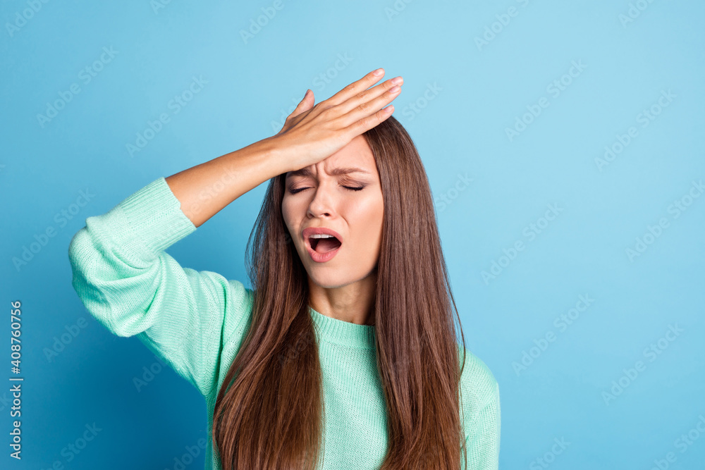 Portrait of lovely worried long-haired girl making facepalm feeling bad feel isolated over bright blue color background Portrait of lovely worried long-haired girl making facepalm feeling bad feel isolated over bright blue color background