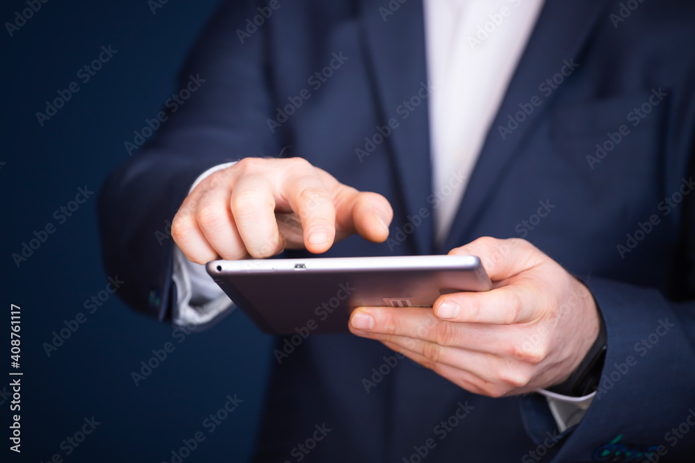 Businessman using tablet, double exposure with network Businessman using tablet, double exposure with network