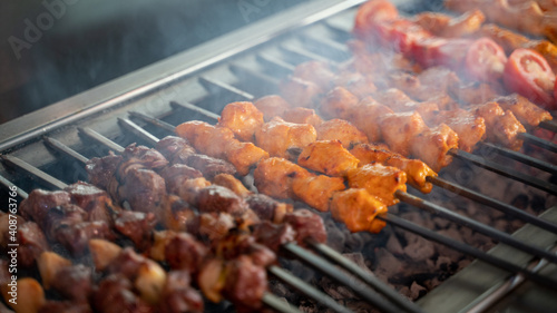 Arabic traditional food Shish taouk and lamb brochette on the grill. traditional food.