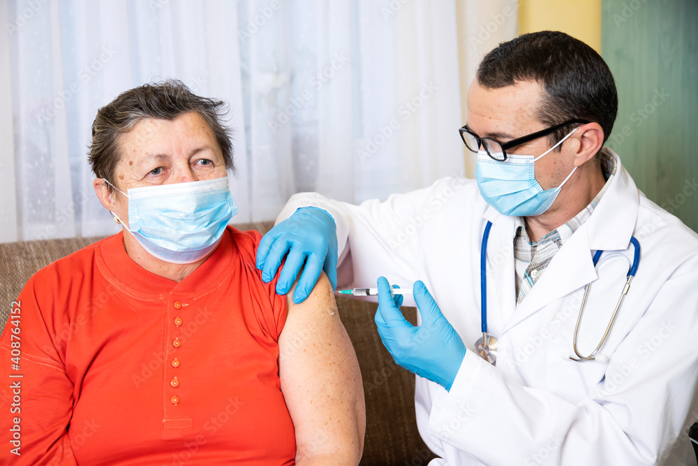 Elderly woman getting coronavirus vaccine Elderly woman getting coronavirus vaccine