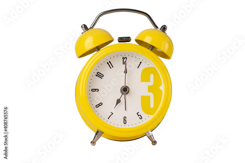 yellow alarm clock isolated on white background