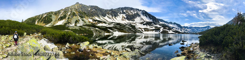 Panoramic view of the Morskie Oko lake with the Tatra mountains in the background