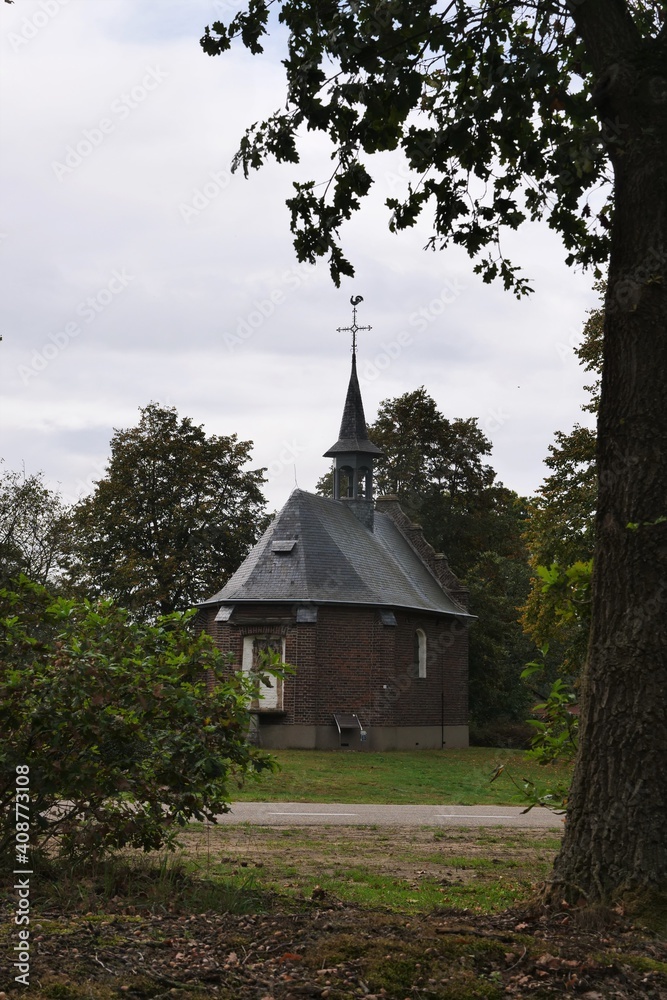 View in rainily weather to the Sint-Rochuskapel chapel in the hamlet of Kamp between Aijen and Well. Founded in 1715 by Derck Daemen. The chapel was badly damaged in 1945, but rebuilt in 1959 View in rainily weather to the Sint-Rochuskapel chapel in the hamlet of Kamp between Aijen and Well. Founded in 1715 by Derck Daemen. The chapel was badly damaged in 1945, but rebuilt in 1959