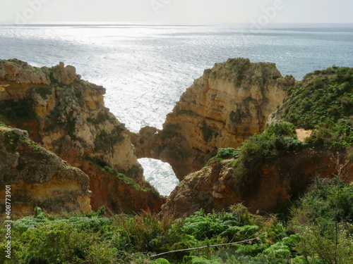 Beautiful stretches of coastline at Lagos, Algarve, Portugal, with cliffs, sand, rocks and sea