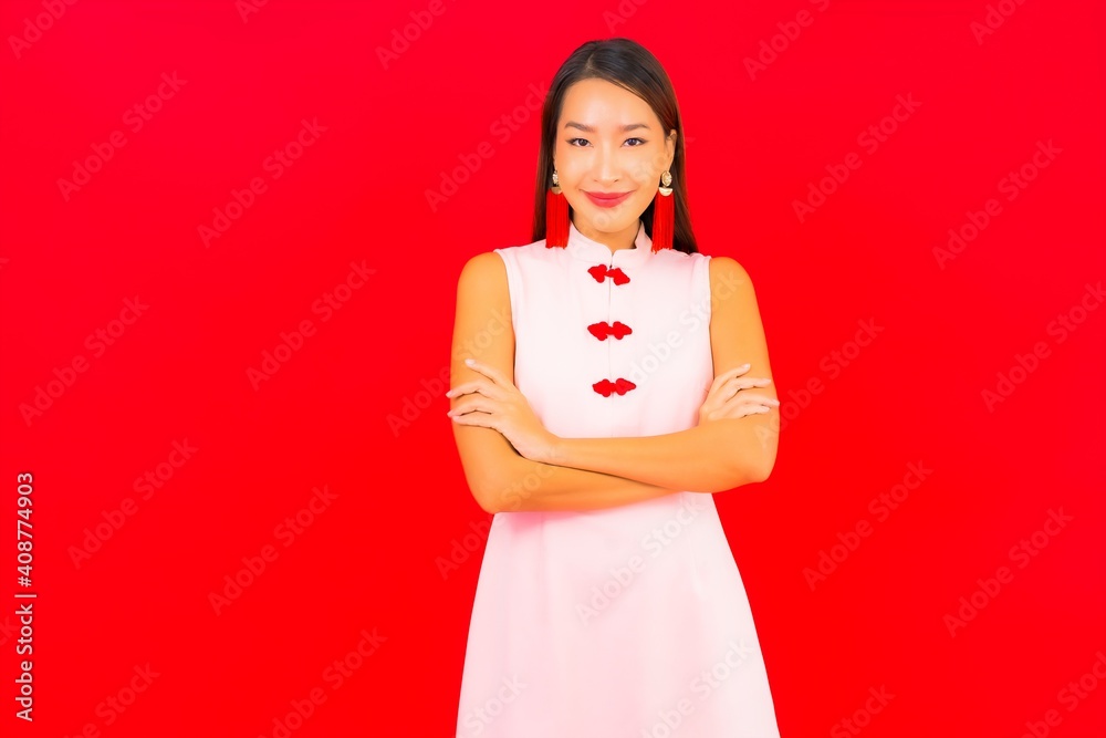 Portrait beautiful young asian woman wear chinese new year clothing Portrait beautiful young asian woman wear chinese new year clothing