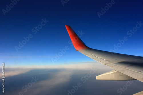 Wing aircraft in the blue sky