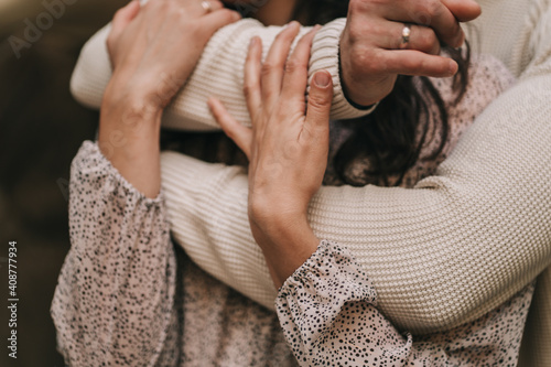 The guy hugs his girlfriend. Husband and wife celebrate valentine's day
