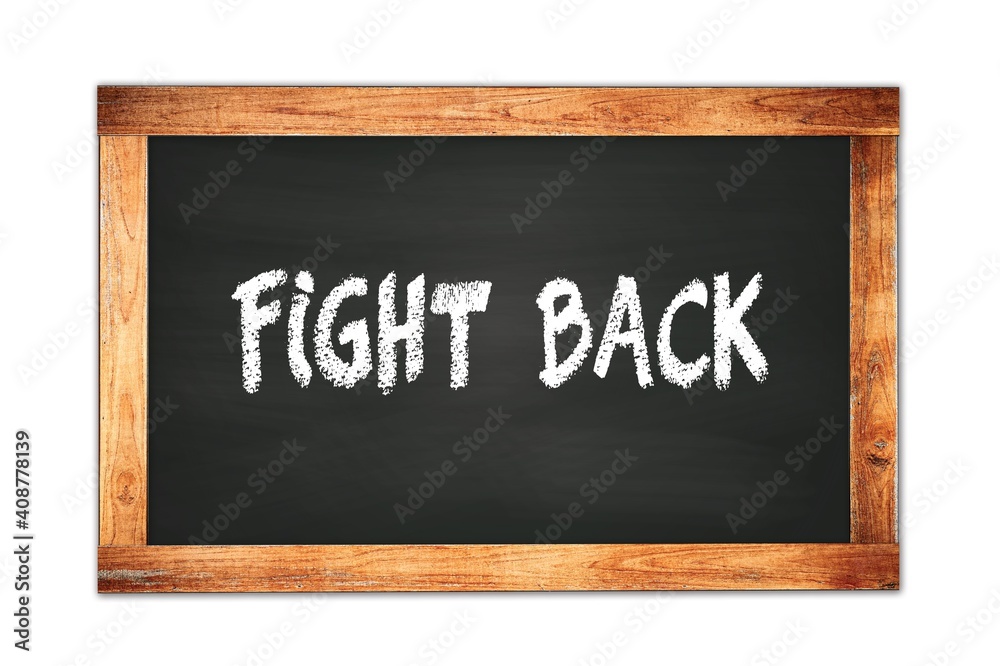 Fototapeta premium FIGHT BACK text written on wooden frame school blackboard.