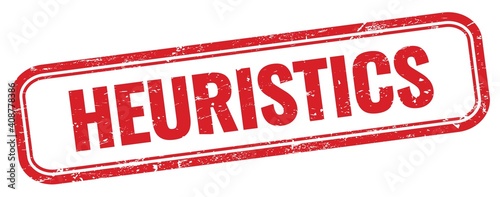 HEURISTICS text on red grungy stamp.