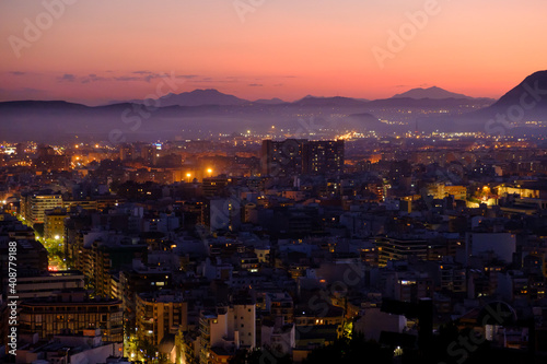 Sunset in alicante city, beautiful views from the santa barbara castle towards the neighborhoods