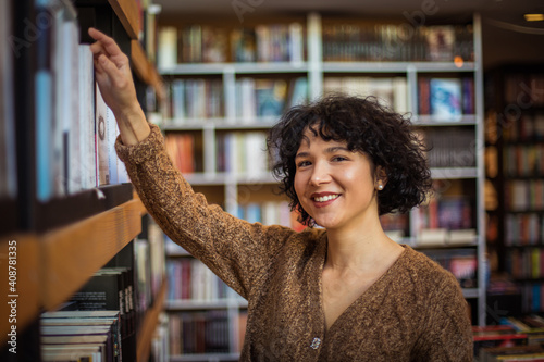 Woman in library.  photo
