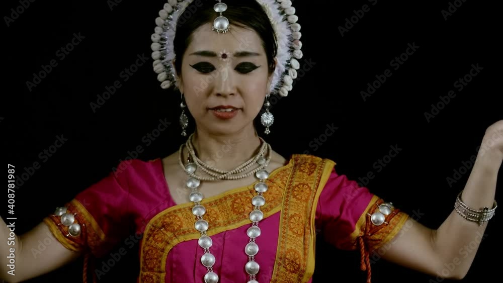 Odissi female asian dancer perform Indian traditional 4k studio black