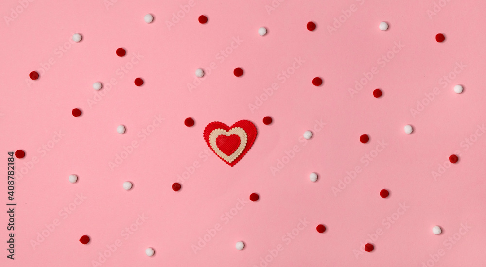 Valentine's day top view flat lay. Silver bow and ribbon with red hearts on gently pink background. Holiday celebration gift concept. Copy space for text. 