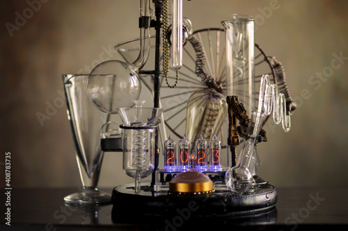 orologio a valvole vecchie con provette  di vetro di laboratorio chimico © tiky224