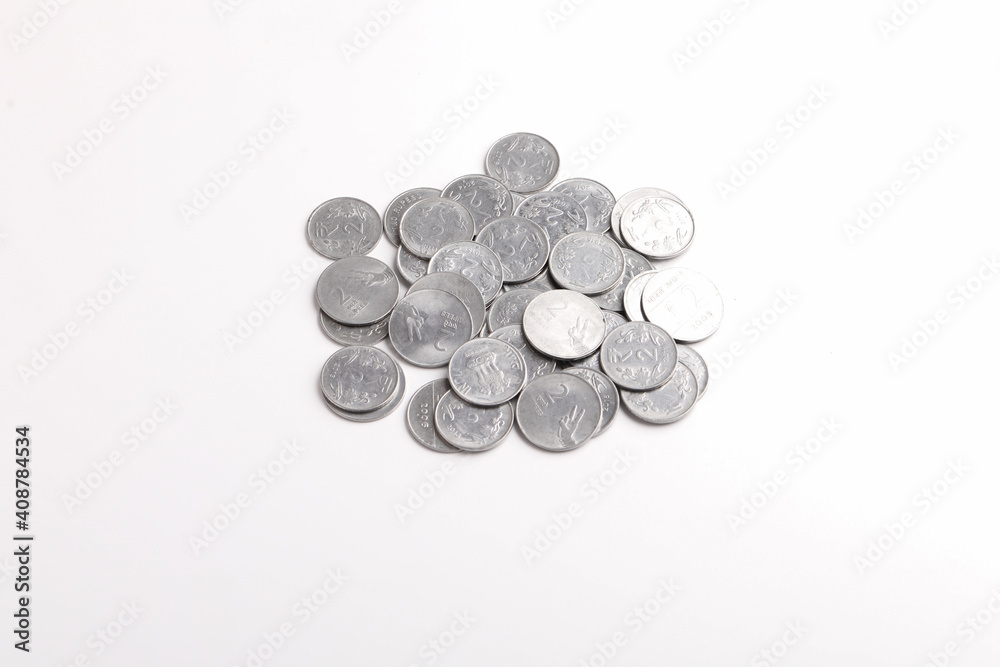 Indian two rupee coins on white background Indian two rupee coins on white background