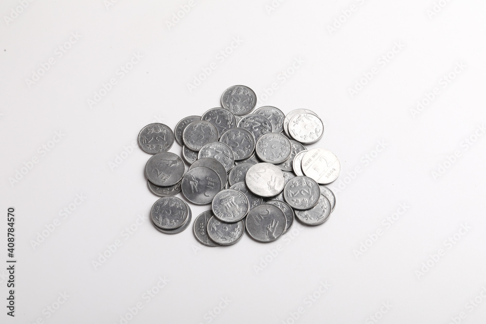 Indian two rupee coins on white background Indian two rupee coins on white background