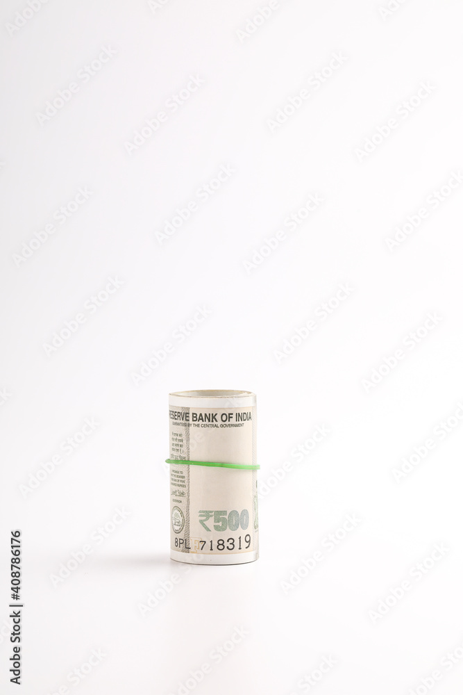 A stack of five hundred rupee notes (Indian currency) isolated on a white background. A stack of five hundred rupee notes (Indian currency) isolated on a white background.