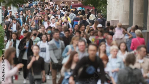 Crowd of people on the street. No recognizable faces
