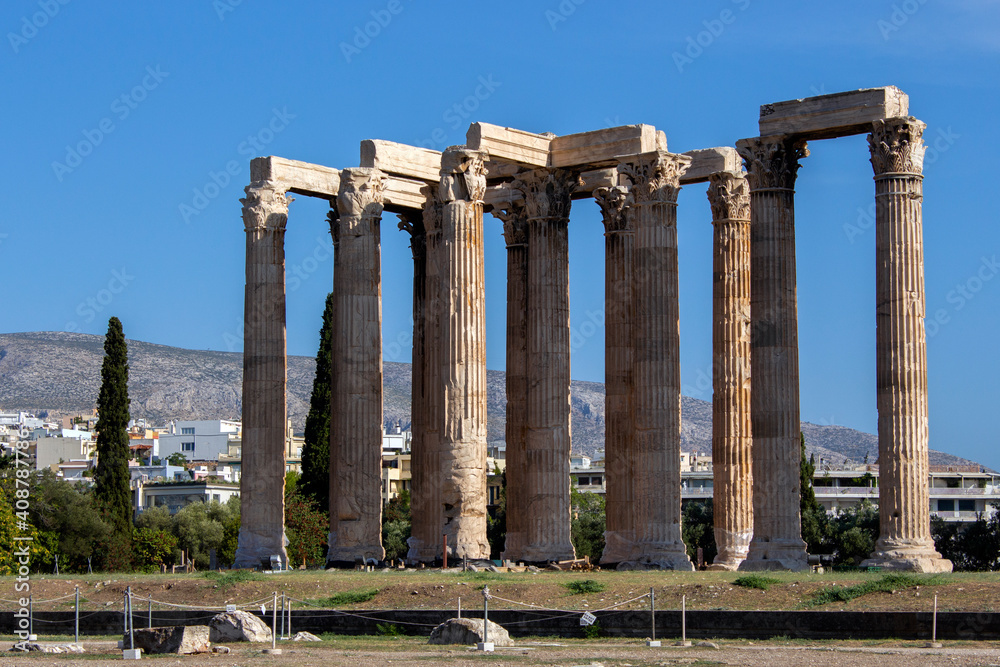 The Temple of Olympian Zeus also known as the Olympieion is a former colossal temple at the center of the Greek capital Athens.  Sunny summer day with blue sky
